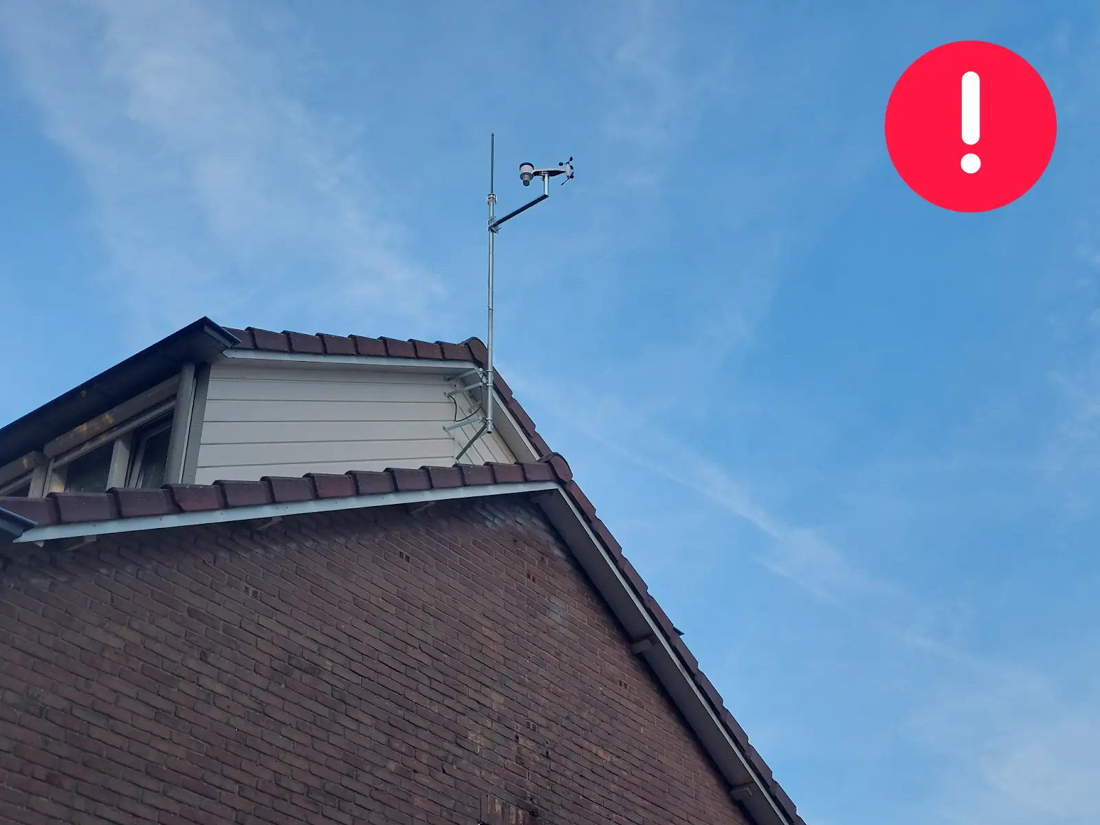 WeatherXM rooftop station before raising the sensor farther above nearby obstacles